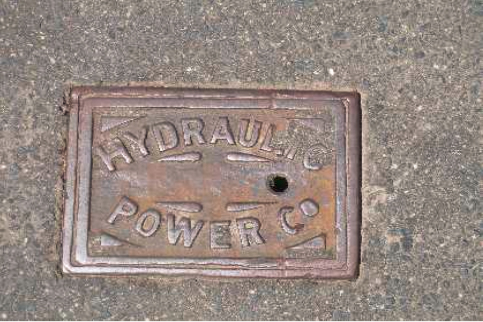 Hydraulic power company valve cover