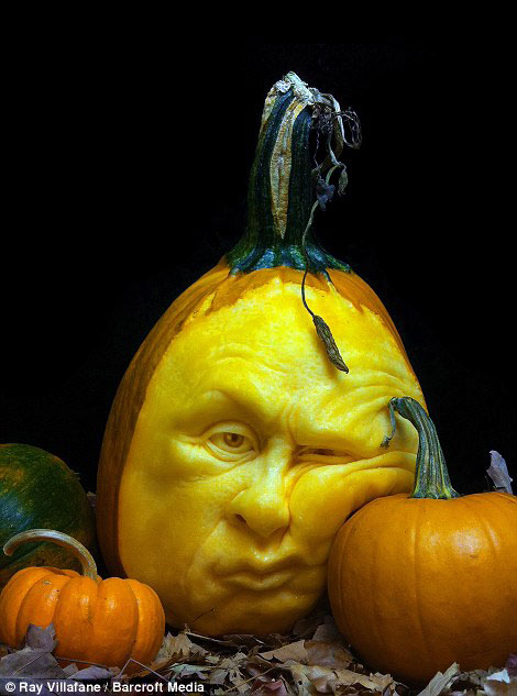 A funny face carved out of a pumpkin by Ray Villafane and team in Bellaire, Michigan